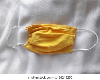 Download Dust Mask Made Yellow Fabric Put Healthcare Medical Stock Image 1456243250 PSD Mockup Templates