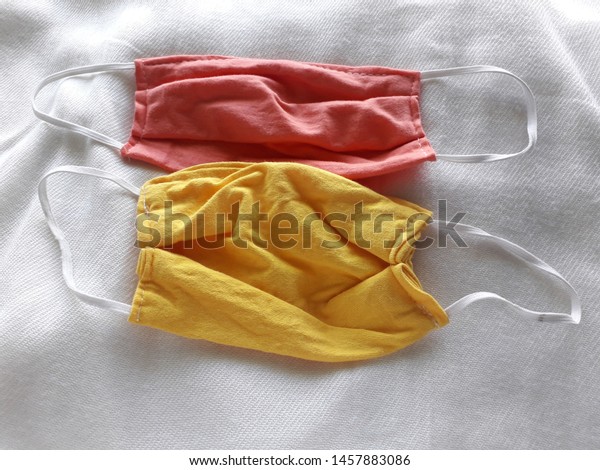 Download Dust Mask Made Yellow Orange Fabric Stock Photo Edit Now 1457883086 PSD Mockup Templates