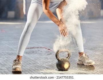 Dust Off Those Workout Clothes And Get Moving. Shot Of An Unrecognisable Woman Dusting Her Hands With Chalk Powder Before Working Out With Weights In A Gym.