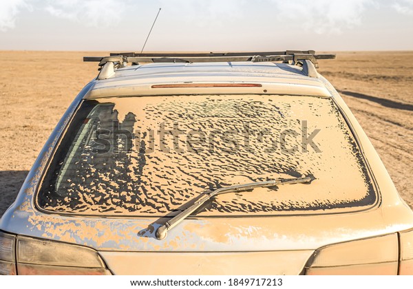Dust on auto glass\
close-up