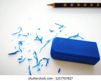 Blue​ Eraser​ And​ Eraser​ Dust On​ Paper