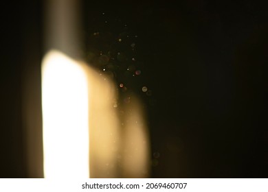 Dust Particles Seen Through Window Light