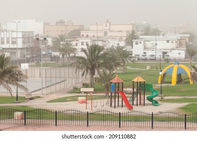 Dust Storm. Playground With Palms, Saudi Arabia