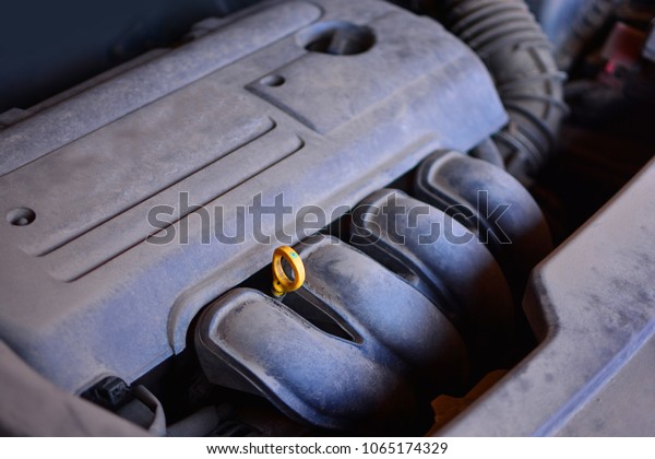 Dusty car\
engine. Motor of a vehicle with a run.\

