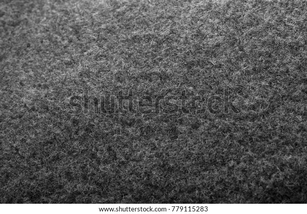 Dusty car mat\
for background, grey dust trap with soft and rough surface which\
always use for automobile\
interior.