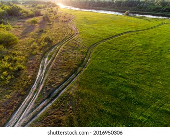 Dusty Roads Go In Different Directions On The Plateau Near The River