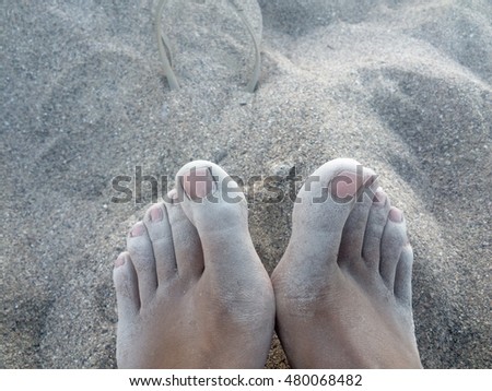 Dusty toes in the sand 