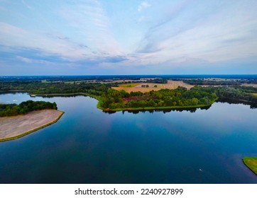 Dutch greenfields water blue sky - Shutterstock ID 2240927899
