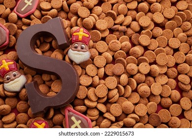 Dutch holiday Sinterklaas background with traditional sweets and chocolate letter.