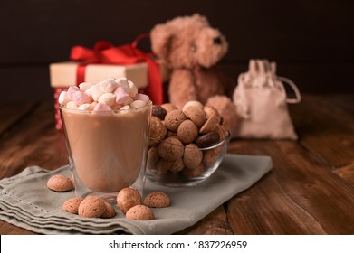 Dutch holiday Sinterklaas. Fragrant black coffee and and cocoa with marshmallows , traditional hollands sweets. Concept for children party Saint Nicholas day five december. Copy sapce. 