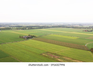 Dutch, Holland, Netherlands panorama landscape for above with trees, grass and villages 