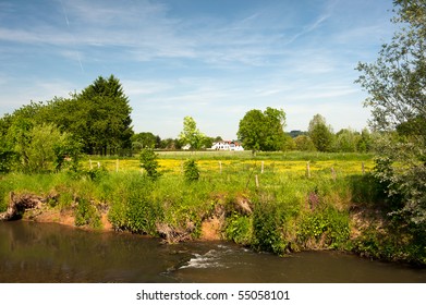 Dutch Landscape In Limburg With River And Residential