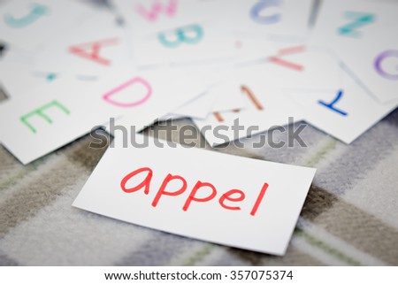 Dutch; Learning the New Word with the Alphabet Cards; Writing APPLE