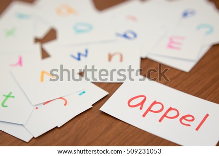 Dutch; Learning the New Word with the Alphabet Cards; Writing APPLE