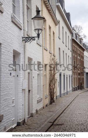 The Dutch medieval old town of Maastricht Limburg Netherlands. Historic buildings and houses. Narrow street