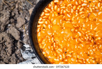 Dutch oven cooking beans - close up - Powered by Shutterstock