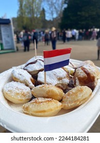 Dutch poffertjes with chocolate and sugar