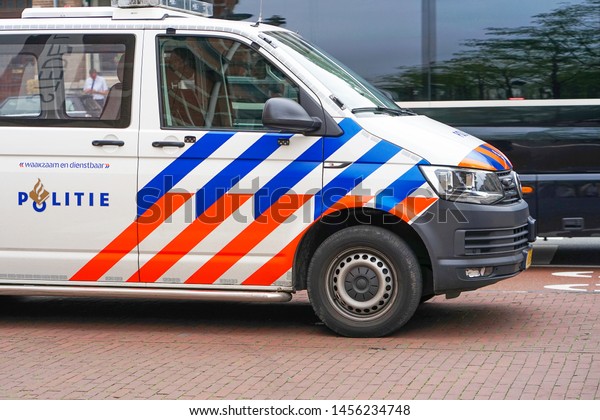 A Dutch police car with text and logo. Nobody in the\
vehicle. 7 September 2018. Rotterdam. Netherlands                  \
    