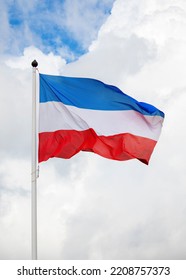 Dutch Red White And Blue Upside Down Flag In Front Of Cloudy Sky. Farmers In The Netherlands Protesting Against Forced Shrinking Of Livestock Because Of Nitrogen Emissions.