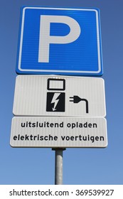 Dutch Road Sign: Parking For Electric Vehicles Only (translation: Only For Charging Electric Vehicles)