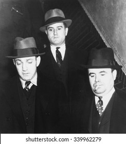 Dutch Schultz (eft) Leaving Jail In Albany, New York. Also Known As Arthur Flegenheimer, He Was Required To Post A $75,000 Bond Prior To His Trial For Tax Evasion. Ca. Jan-Feb., 1935.