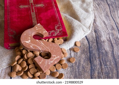 Dutch Sinterklaas tradition: A chocolate letter  the book   bag   candy called Pepernoten 