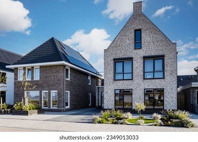 Dutch Suburban area with modern family houses, newly built modern family homes in the Netherlands, dutch family houses in the Netherlands, Modern Middle Class Real Estate on the Real Estate Market 