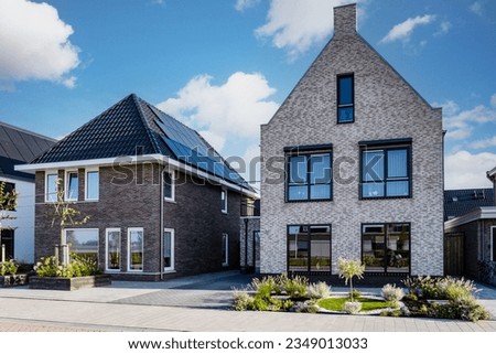 Dutch Suburban area with modern family houses, newly built modern family homes in the Netherlands, dutch family houses in the Netherlands, Modern Middle Class Real Estate on the Real Estate Market 