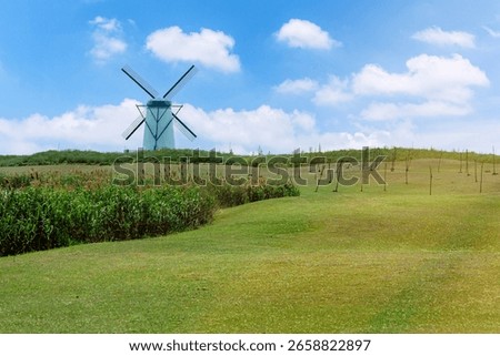 Dutch windmills in the fields