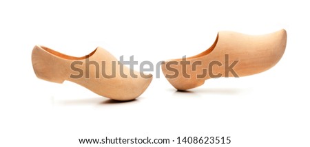 Dutch wooden shoes isolated on white background 