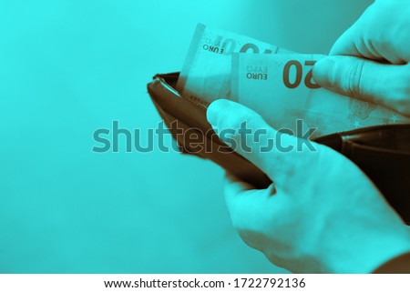 Dutone wallet and money. Concept for recession and economy crisis.