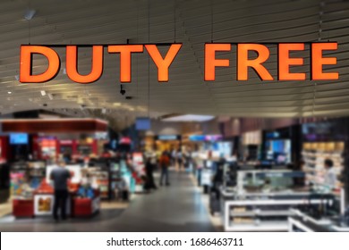 Duty Free shopping, Abstract blur shopping mall and department store at an Airport. Duty free sign in focus