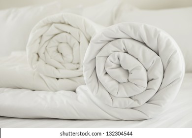 Duvet Roll.  Down Filled Duvet Rolled Up Isolated On White Background