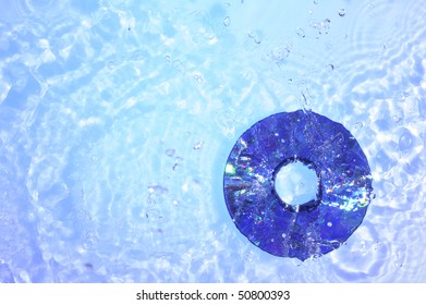 DVD disk on the Creative  background with bubbles
