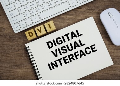 DVI Digital Visual Interface message with keyboard and optical mouse on wooden background