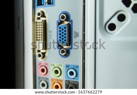 DVI (Digital Visual Interface) and VGA (Video Graphics Array) ports on the back panel of computer.