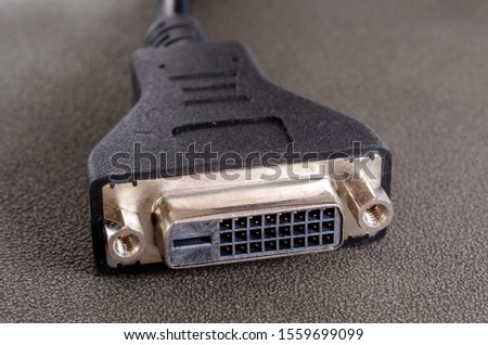 DVI-D adapter cable with female socket/plug interface close up