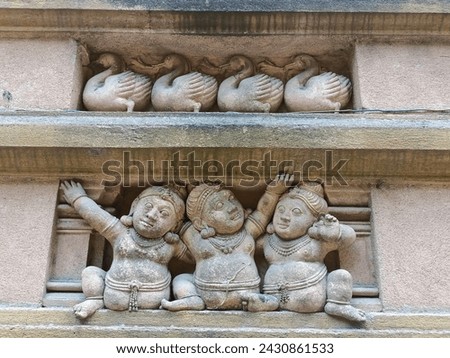 Dwarf and swan carvings temple wall, Kelaniya Temple, near Colombo, Sri Lanka, Asia. 