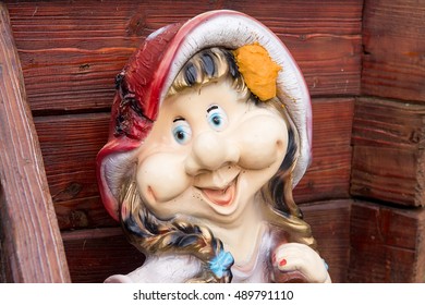 Dwarfs decorate the garden near the house. Sculptures fabulous dwarves. - Powered by Shutterstock