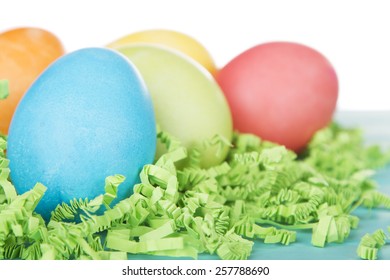 Dyed Easter Eggs On Green Confetti Grass