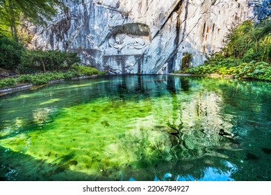 Dying Lion Rock Reflief Reflection Cliff Lucerne Switzerland Created In 1821 By Bertel Thorvaldsen. Monument Swiss Guards Killed In 1792 Protecting King French Revolution