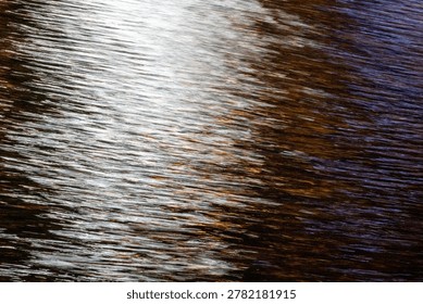 Dynamic abstract background featuring shimmering light trails and motion blur. Metallic silver and golden hues create a sense of rapid movement, volatile energy, and rhythmic dissemination.