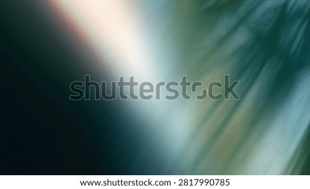 A dynamic abstract background featuring streaks of light and color, suggesting movement and energy. The composition blends dark tones with vibrant blues, greens, and whites.