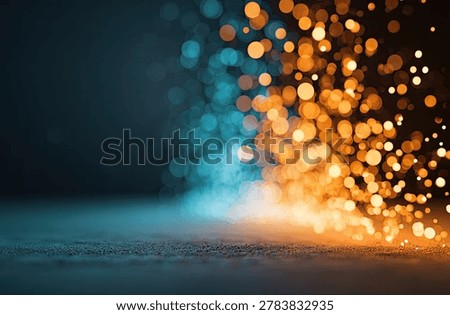 A dynamic abstract background featuring a vibrant explosion of orange and blue bokeh lights and particles, creating a sense of energy and movement.
