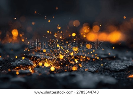 A dynamic abstract image capturing the intense heat and energy of glowing embers and bright sparks against a dark, blurred background.