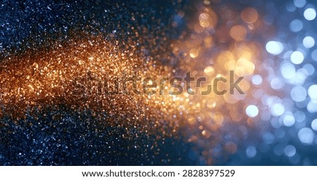 A dynamic abstract image featuring a swirling stream of golden glitter particles transitioning into soft, out-of-focus blue bokeh lights.