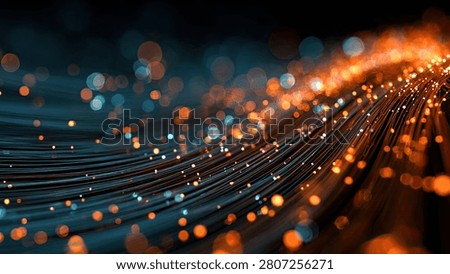 A dynamic abstract visualization of light particles flowing along curved lines, suggesting data transfer or network connections.