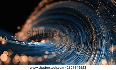Dynamic abstract visualization of swirling blue light trails and glowing bokeh particles, creating a sense of motion and energy.