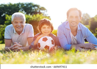 Dynamic charming family resting after a good game - Powered by Shutterstock