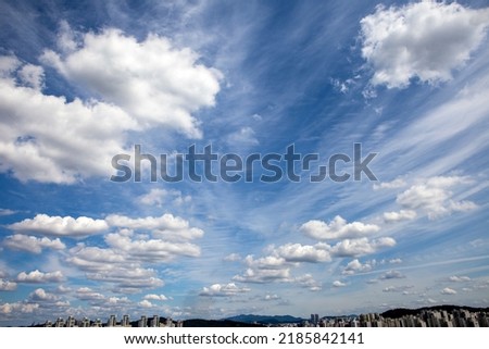 a dynamic cloud in the blue sky
